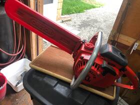 Husqvarna 10045 Vintage Homelite Model Chainsaw With 16 Inch Bar And Chain