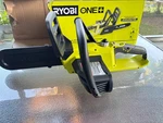 Ryobi P546 18 Volt 10 In. Battery Powered Chainsaw With And Charger Used. Price: $145.00.