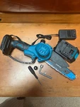 Yunxi 6" Electric Mini Chainsaw Cordless Hand Held 21 Volt Battery New. Price: $25.00.