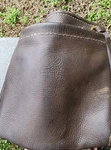 Buckingham-leather Nut And Bolt Bag With Three Inside Pockets Used. Price: $35.00.