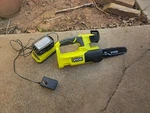 Ryobi One+ 18V Pruning Chainsaw Cordless With Bartey & Charger Used. Price: $99.00.