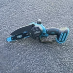 Yunxi Cordless Ergonomic Mini Chainsaw 6" Battery Powered Blue Black Used. Price: $80.00.