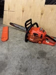 Echo CS-310 Gas Chainsaw Two-handed Grip Brake Bar Cover Orange Black Used. Price: $125.00.