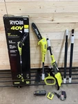 Ryobi RY40560 10 In. 40V Cordless Pole Chainsaw With Battery & Charger Open. Price: $179.99.